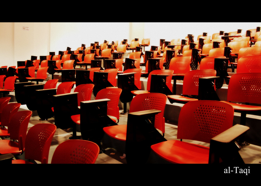 B2B conference audience in a full room